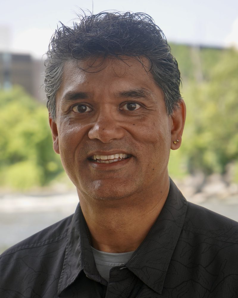 Prosenjit Bose, photographed beside the Rideau River on the Carleton campus